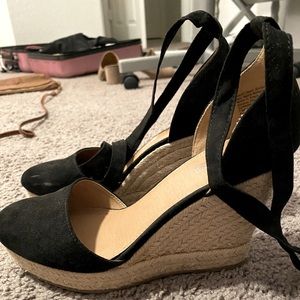 Black brash wedges with straps that tie